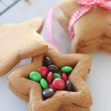 open gingerbread cookie box filled with candies