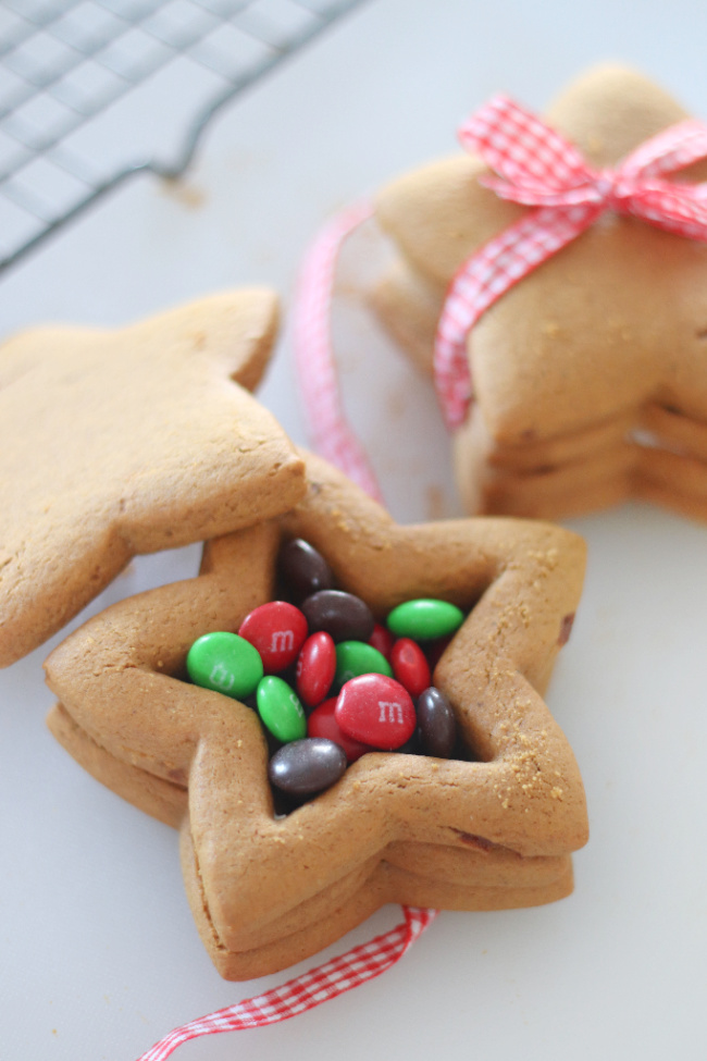 open gingerbread cookie box filled with candies