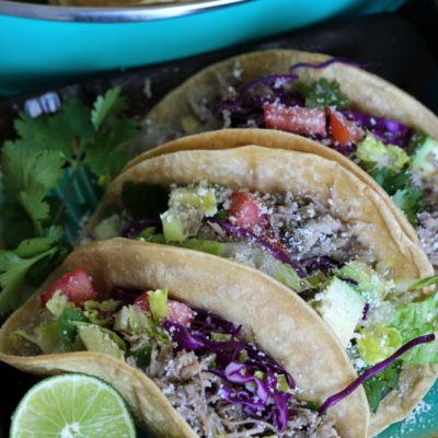 Slow cooker carnitas street tacos take less than 30 minutes to prepare. Let the pork slow cook all day for a quick and easy weeknight dinner!