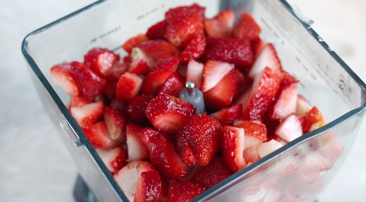 chopped strawberries in blender