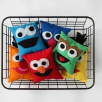 sesame street softies in basket
