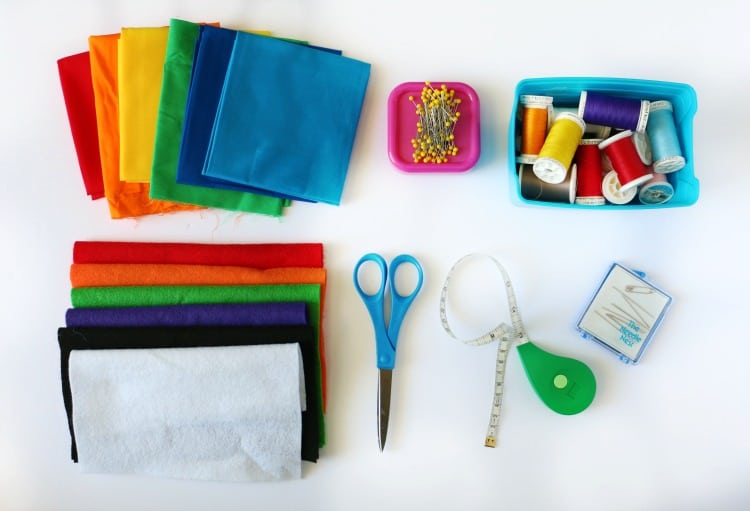 felt, broad cloth, scissors, pins, thread, measuring tape 