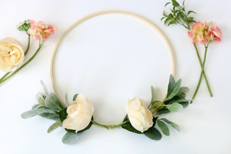 This easy to follow hoop wreath tutorial will guide you step by step, and in 15 minutes you will have your own floral springtime wreath!