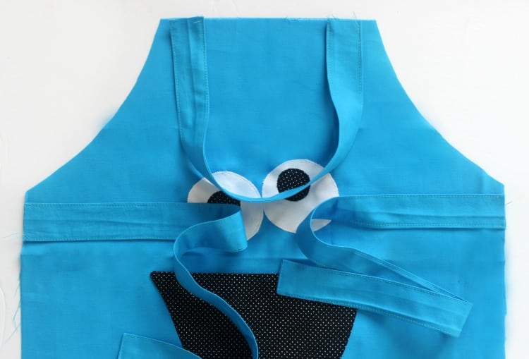 cookie monster apron with neck ties and straps. Ready to be pinned and finished.