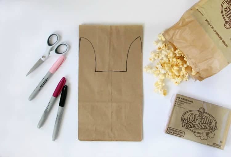Turn paper lunch sacks into bunny treat bags with just a few snips of the scissors. A quick and easy way to make your next movie night even more fun!