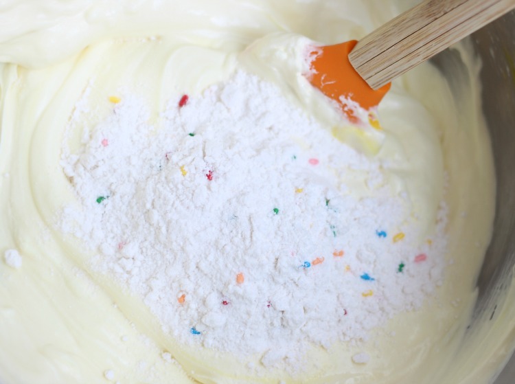 Cake batter ice cream is absolutely delicious and this no churn variety comes together in just minutes. Loaded with sprinkles it is the perfect ice cream for any celebration!