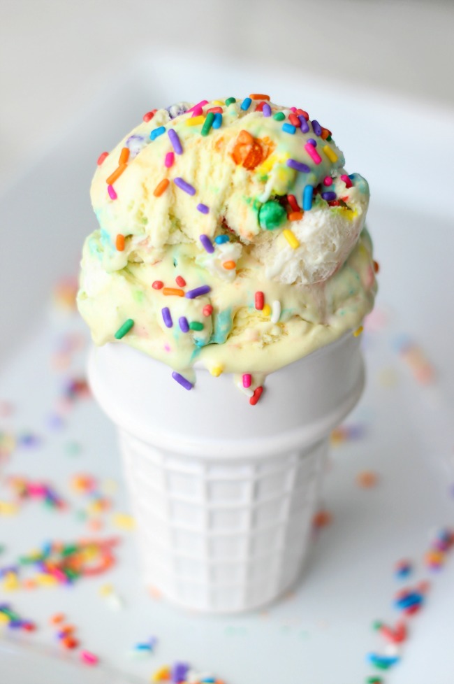 Cake batter ice cream is absolutely delicious and this no churn variety comes together in just minutes. Loaded with sprinkles it is the perfect ice cream for any celebration!