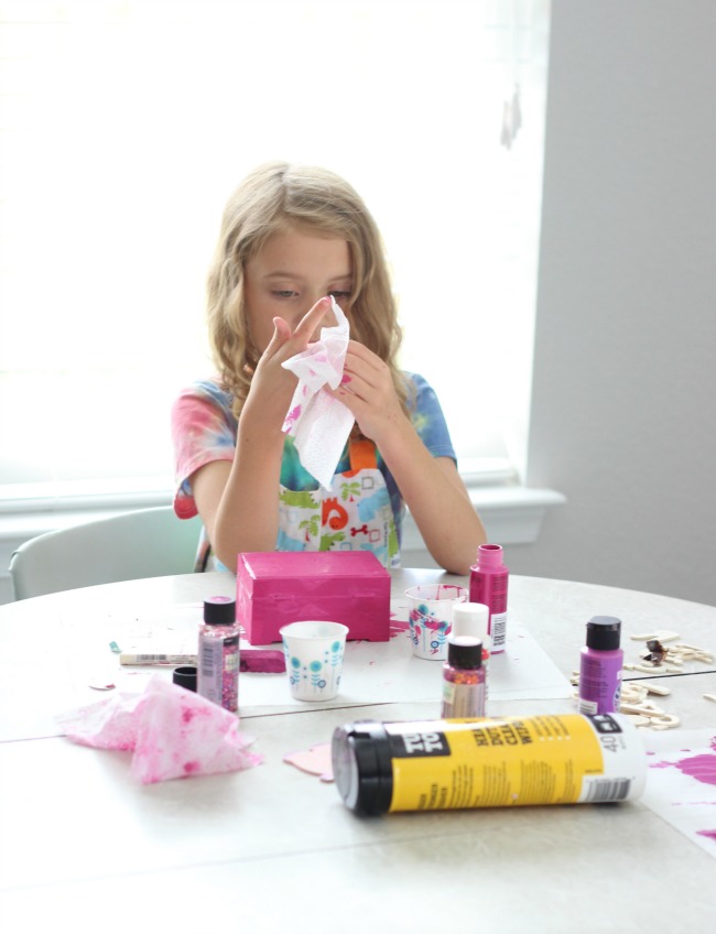 This darling DIY jewelry box is just the right size to organize earrings and rings. These $1.99 boxes are fun to paint and customize and are great for kids! Roll felt around crayons and place them close together to create the spaces for jewelry