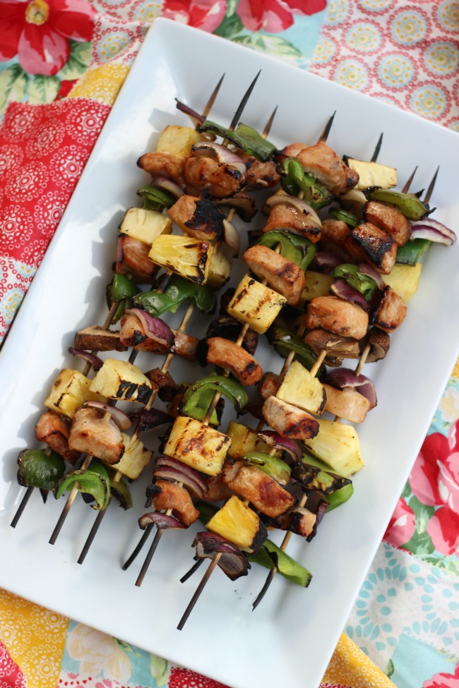Veggie and pork kebabs in 30 minutes! Marinated pork chops and fresh veggies are grilled to perfection for this quick and easy summertime meal!