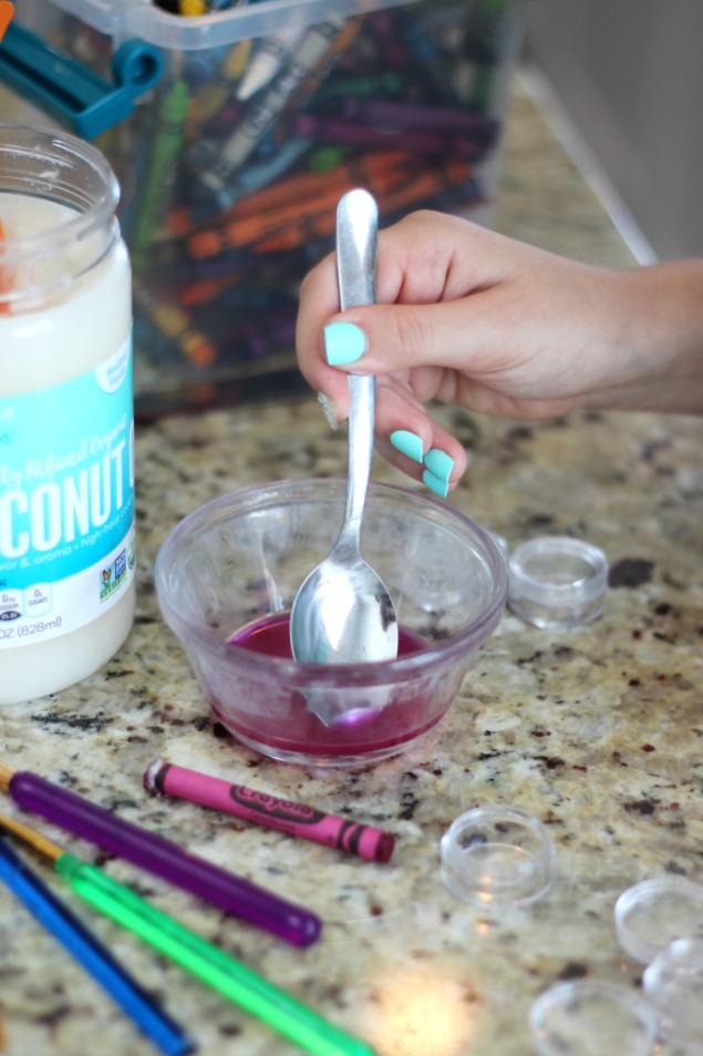 This colorful crayon lip gloss is made from coconut oil and crayons. That's it! Such a simple activity for kids to make. You can add scents if you'd like and make them any color of the rainbow depending on what color of crayon you choose!