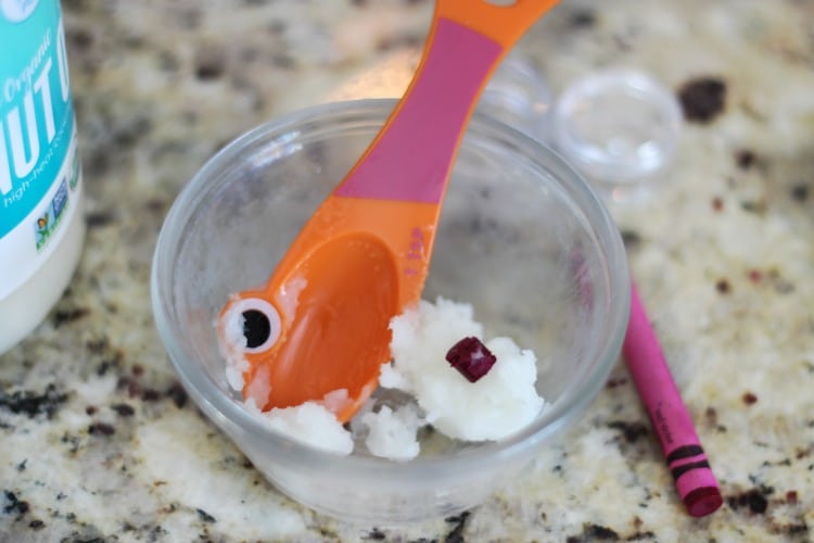 This colorful crayon lip gloss is made from coconut oil and crayons. That's it! Such a simple activity for kids to make. You can add scents if you'd like and make them any color of the rainbow depending on what color of crayon you choose!