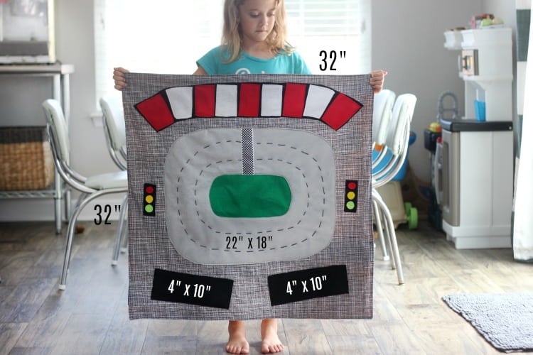 Make a race track play mat to inspire creative play in your home! This double sided mat is soft to sit on and folds up for easy storage. The perfect place to play with your favorite cars and trucks!