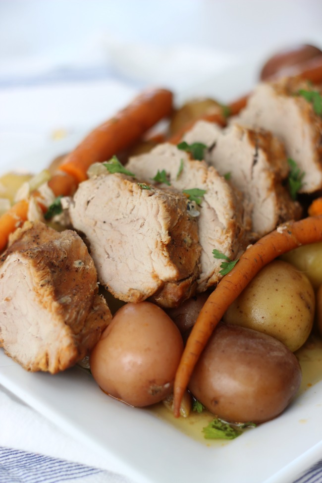 A delicious marinated pork tenderloin with root vegetables that takes 10 minutes to prep and slow cooks all day to perfection. The perfect weeknight meal after a busy day!