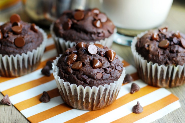 chocolate pumpkin muffins on orange striped napkin