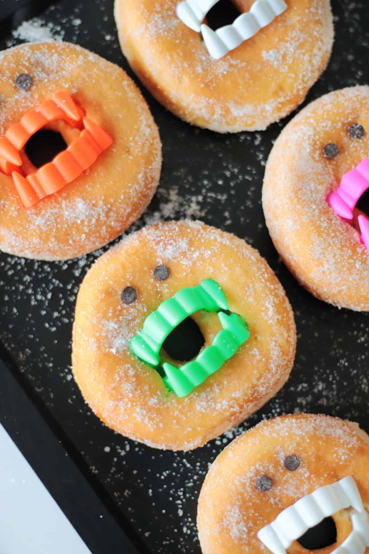Black platter with vampire donuts.
