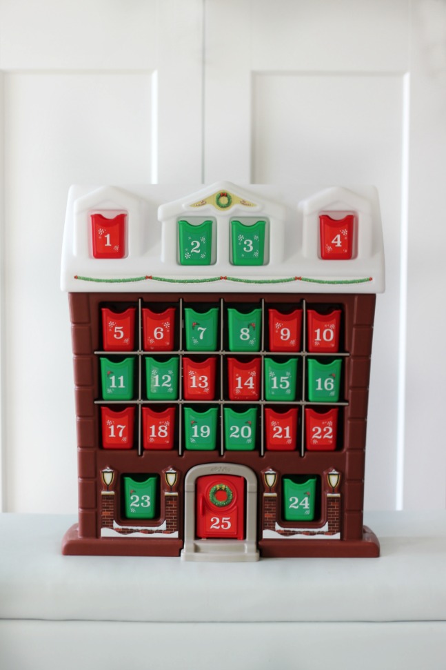 This Step2 advent calendar is perfect for little hands! Children will love finding a treat each day as they pull out the tiny red and green bins! 