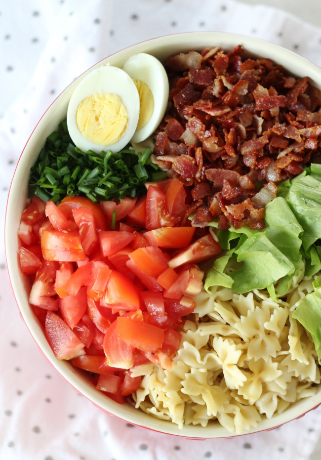 This classic BLT pasta salad combines crispy bacon, locally grown produce, and bow tie pasta. Tossed in a creamy ranch dressing, it's sure to be a hit at any gathering!