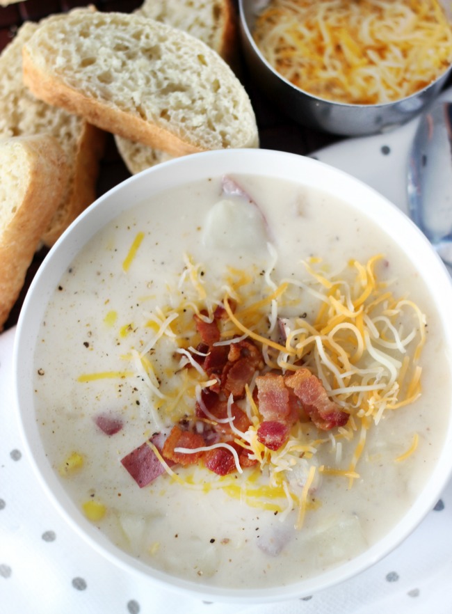 This 30-minute creamy potato soup is what comfort food is all about! Red potatoes, corn, cheese, bacon crumbles and thickened with country gravy!
