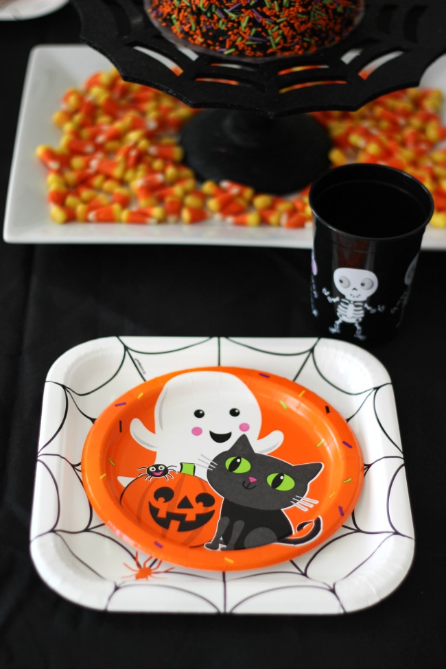 white halloween plate with small plate in center. halloween place setting