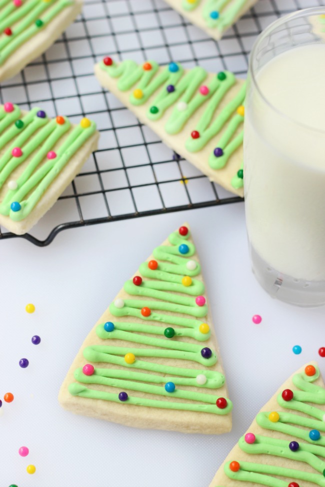 triangle Christmas tree cookies with a glass of milk