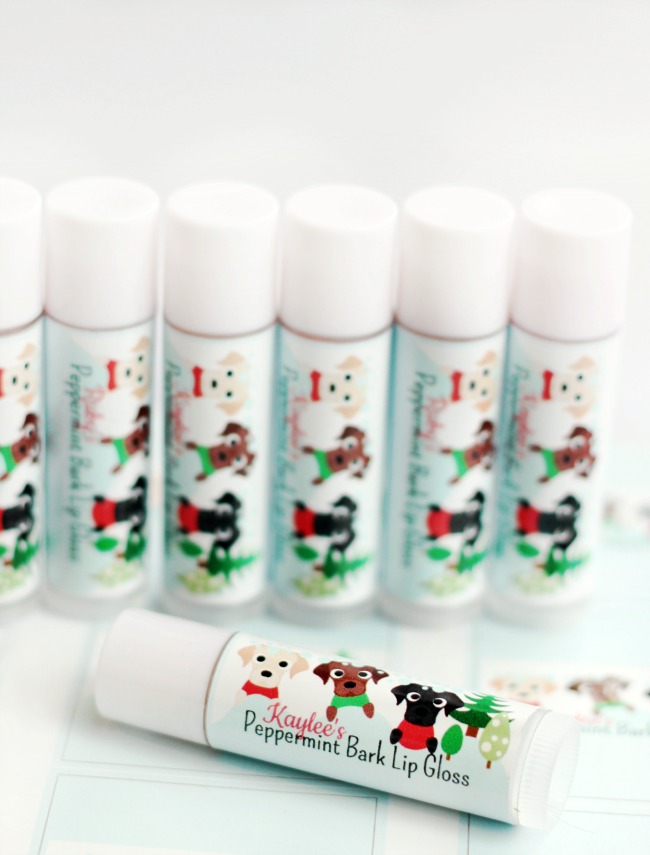 Peppermint bark scented homemade lip balm with cute holiday wrappers! An easy project for kids to help with and they make great holiday gifts!