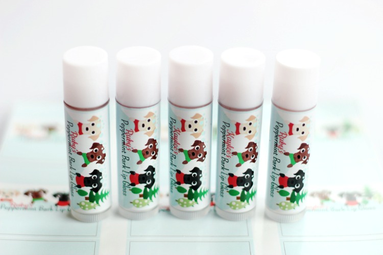 Peppermint bark scented homemade lip balm with cute holiday wrappers! An easy project for kids to help with and they make great holiday gifts!