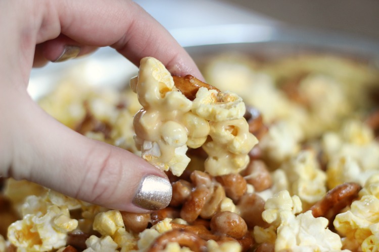 Sweet, salty, buttery, sticky, and crunchy--this marshmallow caramel corn is the perfect snack to munch on with friends!