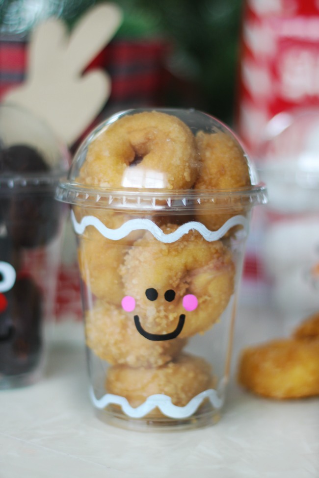 Fill these to-go cups with mini donuts and decorate the front for the most darling holiday party treat cups around! Great for class parties!
