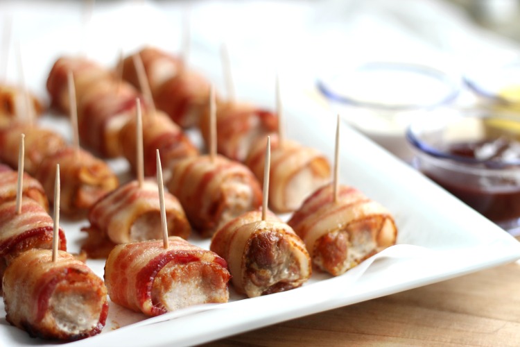 These bacon wrapped pork loin bites are crispy and juicy, come together in 30 minutes and are a the perfect party appetizer!