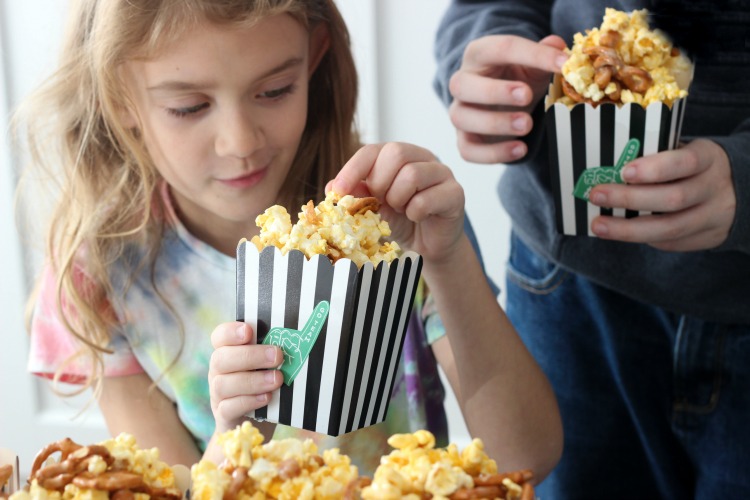 Sweet, salty, buttery, sticky, and crunchy--this marshmallow caramel corn is the perfect snack to munch on with friends!