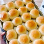 Baking sheet with baked rolls.