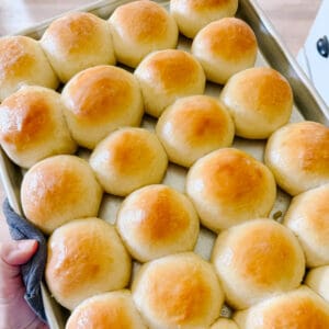 Baking sheet with baked rolls.
