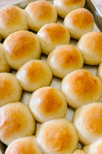 Baking sheet with baked rolls.