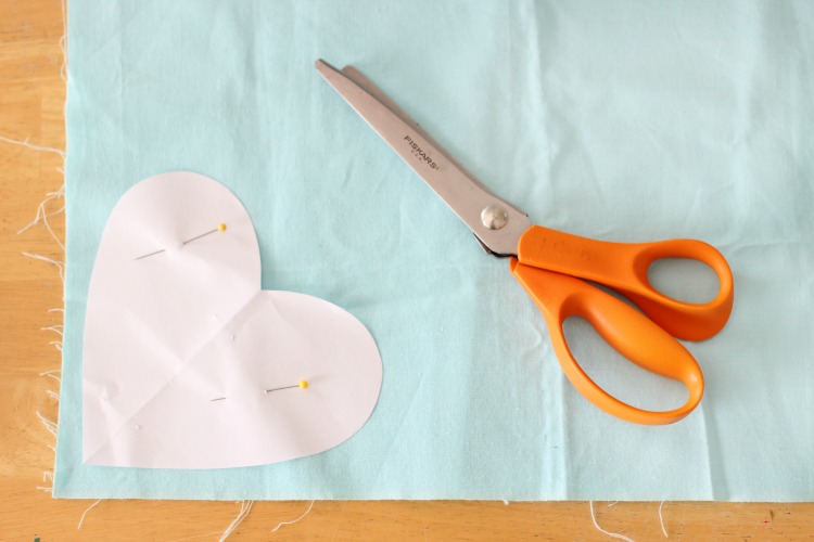 These DIY heart plushies come together quickly, and are a great beginning sewing project for kids! Fill with stuffing, dried lavender or beans!