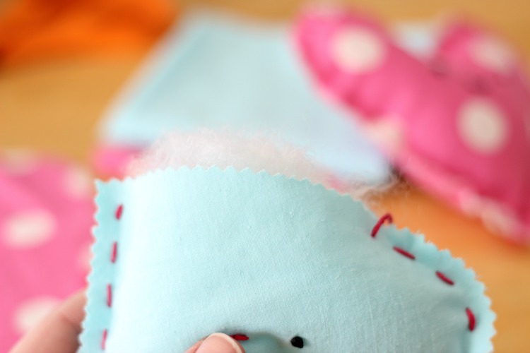 These DIY heart plushies come together quickly, and are a great beginning sewing project for kids! Fill with stuffing, dried lavender or beans!