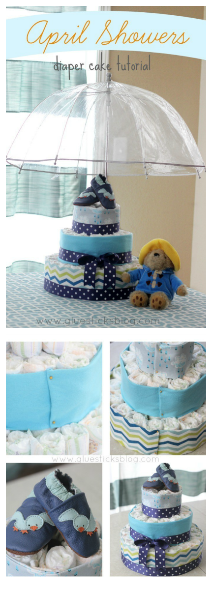 An April Showers diaper cake for a springtime baby shower. Complete with diapers, shoes, and receiving blankets.