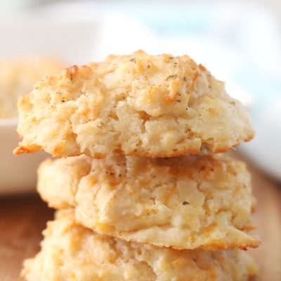3 cheddar biscuits stacked together