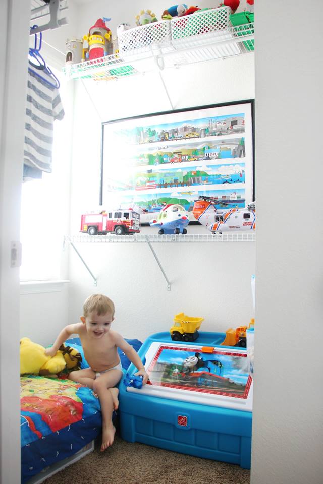 toddler playing in closet bedroom