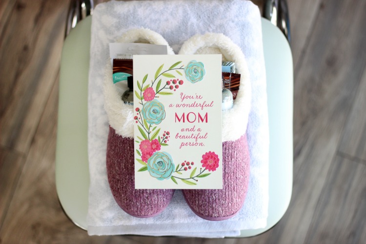 slippers with mothers day card placed on top