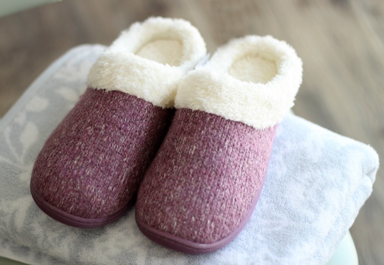 towel folded with slippers on top