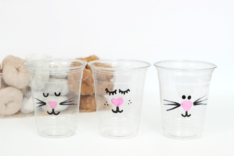 photo of cups decorated with sharpie paint pens