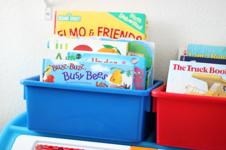 book bins in toddler bedroom