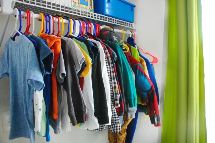 clothing storage in toddler bedroom hanging in closet