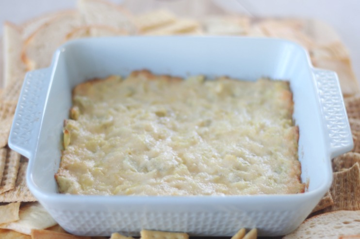 baked artichoke dip in dish