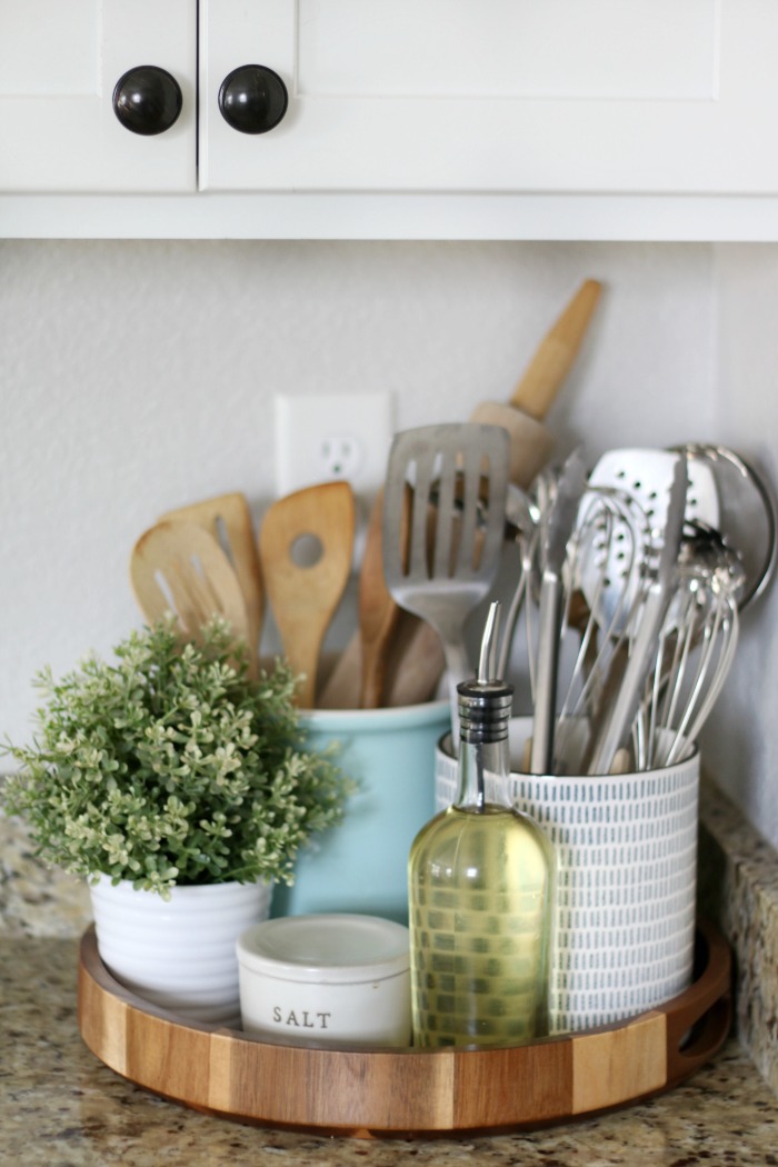 style and clean kitchen countertops wooden serving tray with salt container oil and cooking utensils