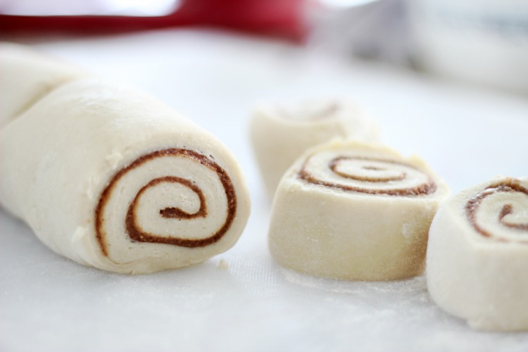 cinnamon rolls sliced and ready to bake