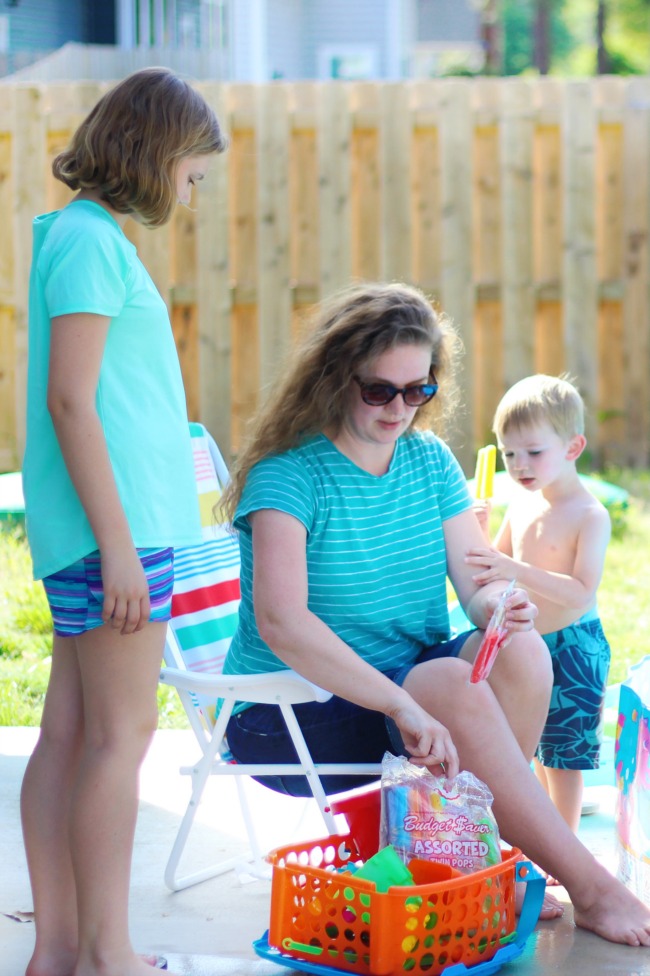 backyard activities for kids: mom and kids enjoying twin pops