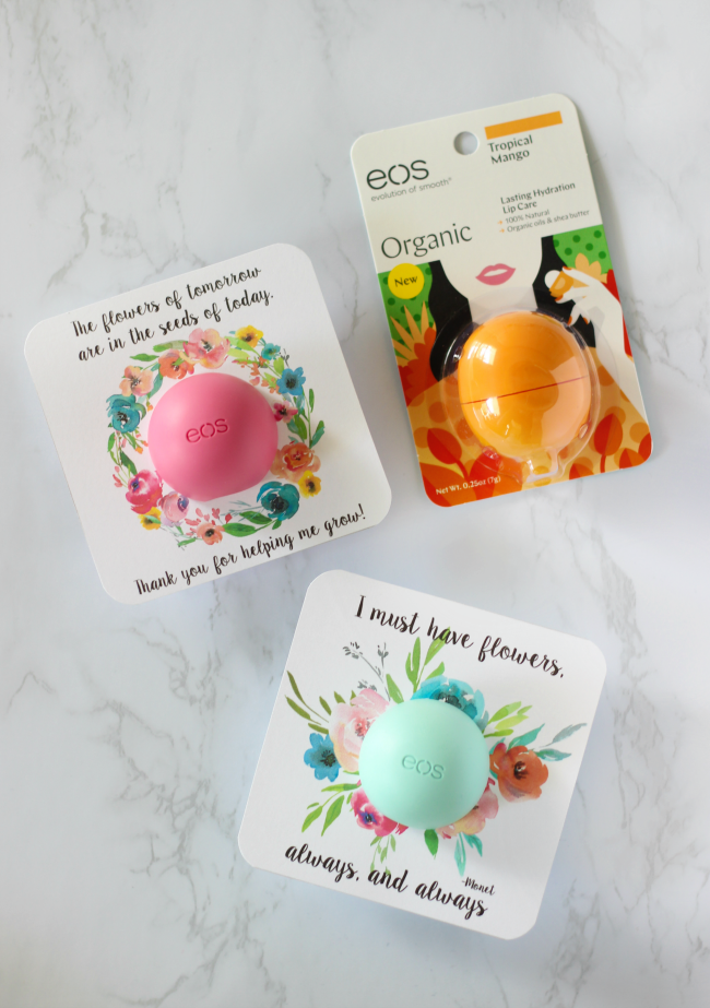 3 EOS lip balms on work surface