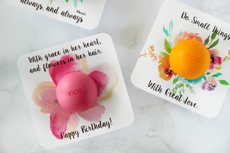 two finished EOS floral printables with lip balm attached
