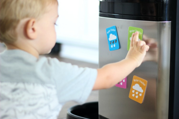 front of water dispenser with printable water tracker magnet